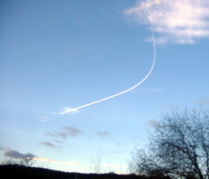 [Photograph of plane turning]