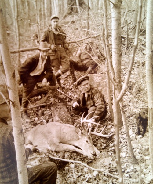 My grandfather's hunting party with their prize.
