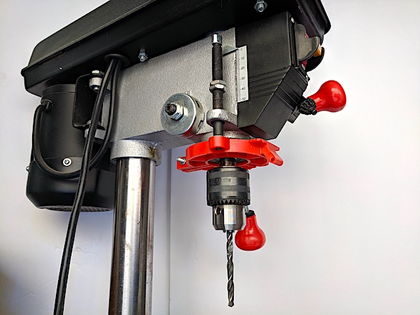 [Drill press with plastic depth stop]