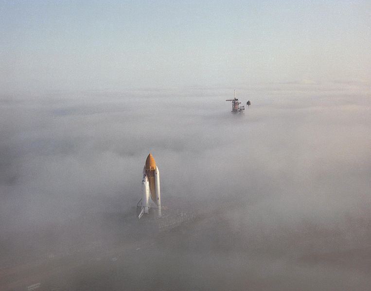 Challenger moving through the fog to the launchpad on her first mission