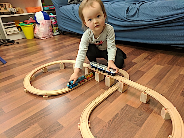 [Beverly playing with trains]