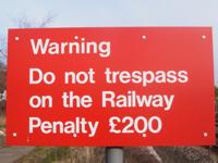 [Warning. Do not trespass on the Railway. Penalty £200]